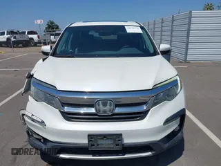 2019 Honda Pilot EX-L z VIN 5FNYF5H54KB018519, wystawiony jako IAAI lot #42170270 z przebiegiem 194 717 mil mil oraz . Historia ofert i sprzedaży dostępna na DreamBid. Obrazek 13.