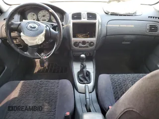 2002 Mazda Protege z VIN JM1BJ245821588413, wystawiony jako Copart lot #58692345 z przebiegiem 205 242 mil mil oraz Szkoda całkowita • Salvage title. Historia ofert i sprzedaży dostępna na DreamBid. Obrazek 8.
