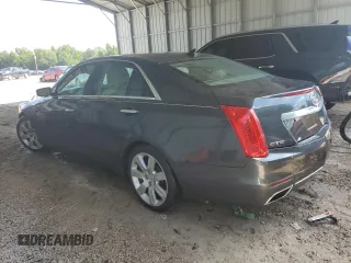 2014 Cadillac CTS Performance RWD with VIN 1G6AS5S37E0140091, listed as a Copart auction lot 60694094 with 130,587 mi miles and Salvage Title. Bid and sale history available at DreamBid. Image 2.