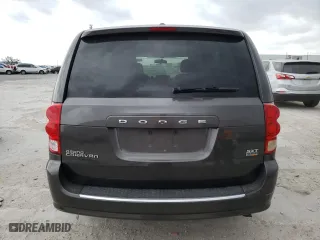 2016 Dodge Grand Caravan SXT with VIN 2C4RDGCGXGR318723, listed as a Copart auction lot 47752125 with 140,398 mi miles and Salvage Title. Bid and sale history available at carsss.com. Image 6.