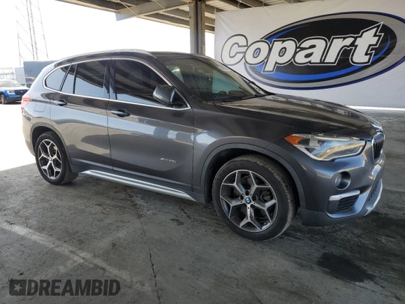 2016 BMW X1 xDrive28i with VIN WBXHT3Z38G4A49061, listed as a Copart auction lot 54010455 with 120,875 mi miles and Salvage Title. Bid and sale history available at DreamBid. Image 4.