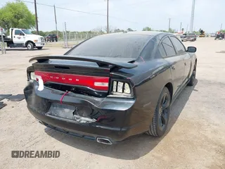 2014 Dodge Charger SXT with VIN 2C3CDXHG3EH122158, listed as a IAAI auction lot 41861010 with 122,842 mi miles. Bid and sale history available at carsss.com. Image 4.