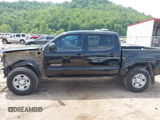 2015 Toyota Tacoma PreRunner with VIN 3TMJU4GN5FM189557, listed as a IAAI auction lot 42387542 with 189,188 mi miles and . Bid and sale history available at DreamBid. Image 14.