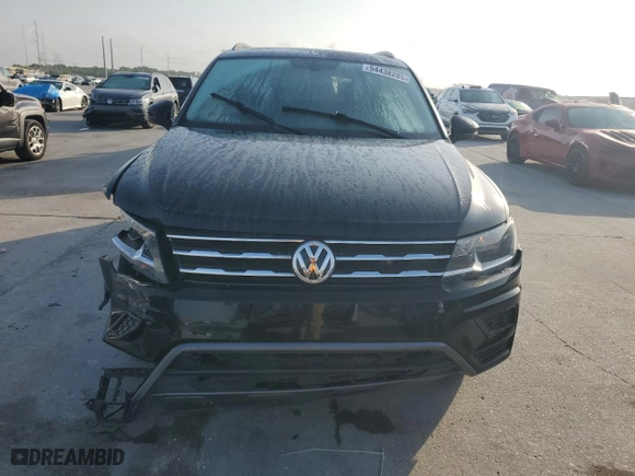 2021 Volkswagen Tiguan SE with VIN 3VV3B7AXXMM085722, listed as a Copart auction lot 54438285 with 76,746 mi miles and Clean Title. Bid and sale history available at carsss.com. Image 5.