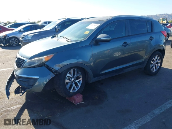 2015 Kia Sportage LX with VIN KNDPB3ACXF7696918, listed as a IAAI auction lot 42179023 with 64,181 mi miles and . Bid and sale history available at DreamBid. Image 2.