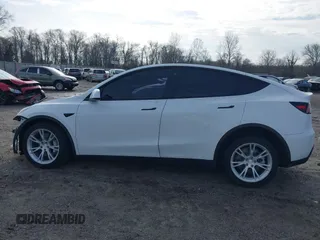 2022 Tesla Model Y Long Range z VIN 7SAYGDEE0NF435252, wystawiony jako IAAI lot #41449612 z przebiegiem 48 671 mil mil oraz . Historia ofert i sprzedaży dostępna na DreamBid. Obrazek 14.