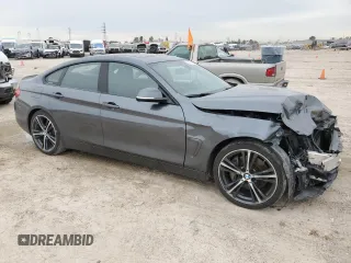 2018 BMW 4 Series 440i with VIN WBA4J5C53JBF07516, listed as a Copart auction lot 86118784 with 154,460 mi miles and Salvage Title. Bid and sale history available at DreamBid. Image 4.