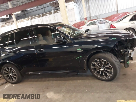 2022 BMW X5 xDrive45e with VIN 5UXTA6C05N9L41274, listed as a IAAI auction lot 42247190 with 18,701 mi miles and . Bid and sale history available at DreamBid. Image 14.
