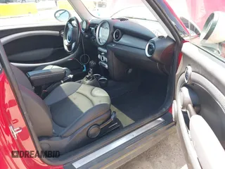 2009 MINI Hardtop S with VIN WMWMF73529TW84638, listed as a IAAI auction lot 42565544 with 60,721 mi miles and . Bid and sale history available at DreamBid. Image 5.