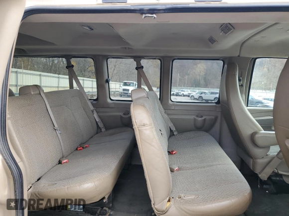 2011 Chevrolet Express Passenger 1LT z VIN 1GAZG1FG2B1154258, wystawiony jako Copart lot #78729104 z przebiegiem 180 662 mil mil oraz Szkoda całkowita • Salvage title. Historia ofert i sprzedaży dostępna na DreamBid. Obrazek 11.