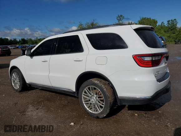 2015 Dodge Durango Limited with VIN 1C4RDJDG8FC861331, listed as a Copart auction lot 58251445 with 131,950 mi miles and Salvage title. Bid and sale history available at DreamBid. Image 2.