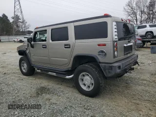 2004 Hummer H2 with VIN 5GRGN23U24H118230, listed as a Copart auction lot 87764075 with 202,206 mi miles and Salvage Title. Bid and sale history available at carsss.com. Image 2.