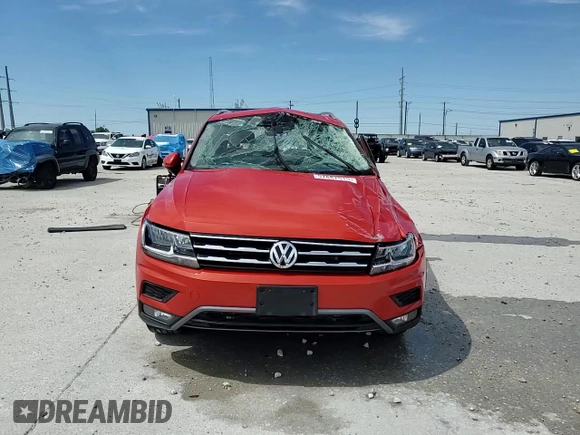 2018 Volkswagen Tiguan SEL с VIN 3VV3B7AX6JM021060, выставлен на аукционе Copart как лот 57887515 с пробегом 20 176 миль миль и На запчасти • Non repairable. История ставок и продаж доступна на DreamBid. Изображение 14.