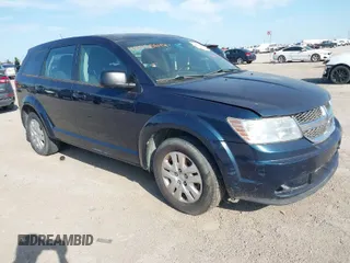 2015 Dodge Journey American Value Pkg with VIN 3C4PDCAB1FT595490, listed as a IAAI auction lot 42050644 with 243,014 mi miles. Bid and sale history available at carsss.com. Image 1.