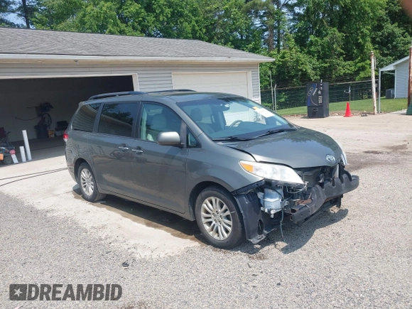2011 Toyota Sienna XLE AAS z VIN 5TDYK3DC3BS146444, wystawiony jako IAAI lot #42390511 z przebiegiem 230 091 mil mil oraz . Historia ofert i sprzedaży dostępna na DreamBid. Obrazek 1.