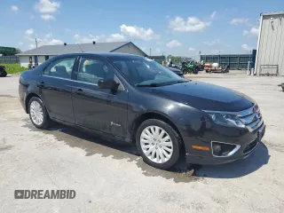 2010 Ford Fusion Hybrid z VIN 3FADP0L36AR176691, wystawiony jako Copart lot #61957685 z przebiegiem 105 452 mil mil oraz Czysty tytuł • Clean title. Historia ofert i sprzedaży dostępna na DreamBid. Obrazek 4.