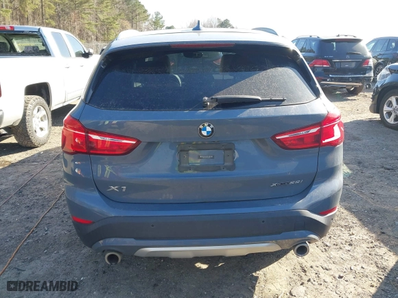 2021 BMW X1 xDrive28i with VIN WBXJG9C07M5T23053, listed as a IAAI auction lot 41774663 with 66,770 mi miles. Bid and sale history available at carsss.com. Image 16.