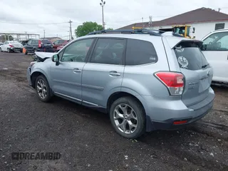 2018 Subaru Forester Touring with VIN JF2SJAWC6JH496875, listed as a IAAI auction lot 42347532 with 70,978 mi miles and . Bid and sale history available at DreamBid. Image 3.