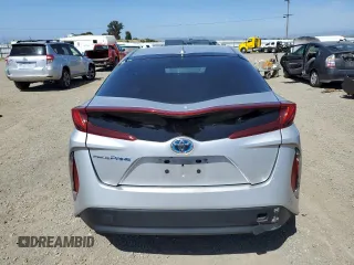 2017 Toyota Prius Plus z VIN JTDKARFP5H3003260, wystawiony jako Copart lot #56844965 z przebiegiem Nie podano mil oraz Szkoda całkowita • Salvage title. Historia ofert i sprzedaży dostępna na DreamBid. Obrazek 6.