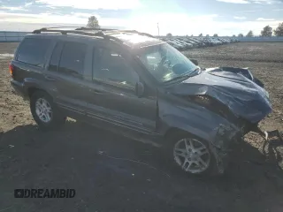 2003 Jeep Grand Cherokee Limited z VIN 1J8GW58N73C502929, wystawiony jako Copart lot #79472734 z przebiegiem 231 176 mil mil oraz Szkoda całkowita • Salvage title. Historia ofert i sprzedaży dostępna na DreamBid. Obrazek 4.