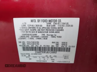 2018 Ford Taurus SEL z VIN 1FAHP2E85JG124997, wystawiony jako IAAI lot #42194985 z przebiegiem 86 456 mil mil oraz . Historia ofert i sprzedaży dostępna na DreamBid. Obrazek 9.