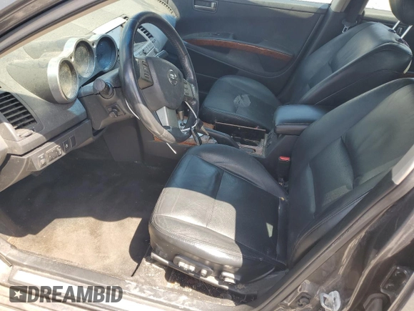 2004 Nissan Maxima SE with VIN 1N4BA41E74C928793, listed as a Copart auction lot 64747725 with 169,623 mi miles and Clean title. Bid and sale history available at DreamBid. Image 7.