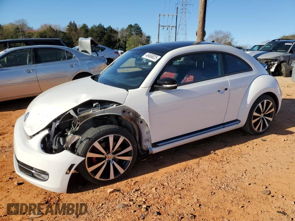 2012 Volkswagen Beetle 2.0T Turbo w/Sun/Snd/Nav PZEV with VIN 3VWVA7AT9CM656846, listed as a Copart auction lot 49466825 with 76,362 mi miles and Salvage Title. Bid and sale history available at carsss.com. Image 1.