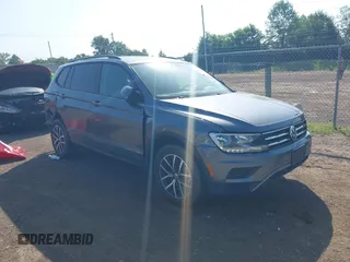 2021 Volkswagen Tiguan S z VIN 3VV0B7AX3MM038342, wystawiony jako IAAI lot #42545665 z przebiegiem 66 089 mil mil oraz . Historia ofert i sprzedaży dostępna na DreamBid. Obrazek 1.