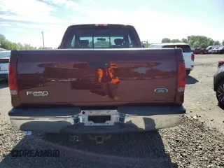 2004 Ford F-250 XL with VIN 1FTNX21P64EB90565, listed as a Copart auction lot 59022005 with 223,577 mi miles and Salvage title. Bid and sale history available at DreamBid. Image 6.