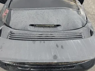 1999 Porsche 911 z VIN WP0CA2990XS651649, wystawiony jako Copart lot #45002045 z przebiegiem Nie podano mil oraz Szkoda całkowita • Salvage title. Historia ofert i sprzedaży dostępna na DreamBid. Obrazek 11.