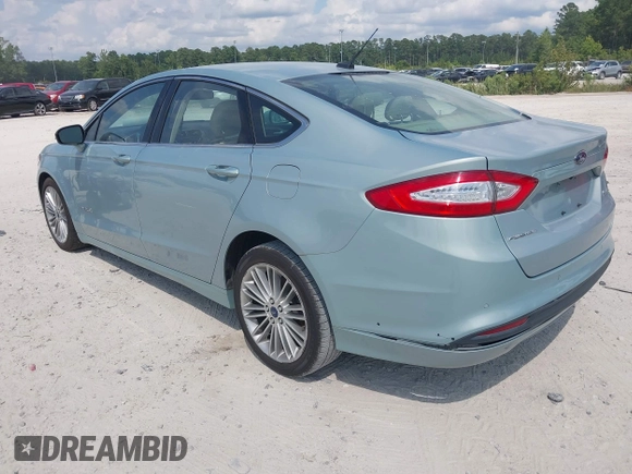2013 Ford Fusion SE Hybrid z VIN 3FA6P0LU8DR265460, wystawiony jako IAAI lot #42720385 z przebiegiem 146 179 mil mil oraz . Historia ofert i sprzedaży dostępna na DreamBid. Obrazek 3.
