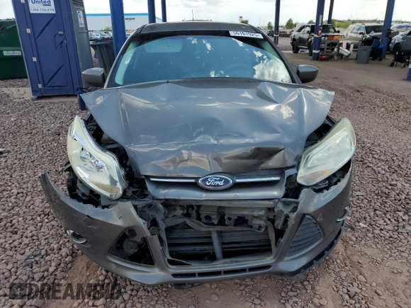 2012 Ford Focus SE z VIN 1FAHP3K24CL338153, wystawiony jako Copart lot #56161925 z przebiegiem 167 146 mil mil oraz Szkoda całkowita • Salvage title. Historia ofert i sprzedaży dostępna na DreamBid. Obrazek 5.