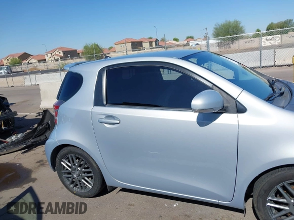 2014 Scion iQ with VIN JTNJJXB02EJ027026, listed as a IAAI auction lot 42619439 with 103,261 mi miles and . Bid and sale history available at DreamBid. Image 13.