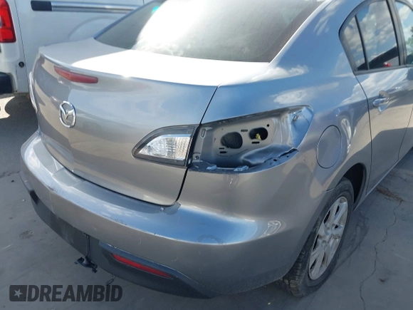 2010 Mazda 3 i SV with VIN JM1BL1SF4A1148543, listed as a IAAI auction lot 40110323 with 131,801 mi miles and . Bid and sale history available at DreamBid. Image 13.