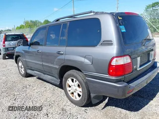2003 Lexus LX with VIN JTJHT00W233532297, listed as a IAAI auction lot 42189676 with 235,992 mi miles. Bid and sale history available at carsss.com. Image 3.