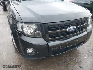 2011 Ford Escape XLT with VIN 1FMCU9DG7BKB03271, listed as a IAAI auction lot 41711731 with 139,135 mi miles. Bid and sale history available at carsss.com. Image 6.