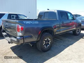 2023 Toyota Tacoma SR5 z VIN 3TMDZ5BN6PM153633, wystawiony jako IAAI lot #42353187 z przebiegiem 50 020 mil mil oraz . Historia ofert i sprzedaży dostępna na DreamBid. Obrazek 4.