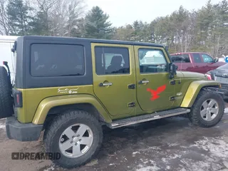 2007 Jeep Wrangler Unlimited Sahara z VIN 1J4GA59137L147257, wystawiony jako IAAI lot #41565673 z przebiegiem 187 982 mil mil oraz . Historia ofert i sprzedaży dostępna na DreamBid. Obrazek 13.
