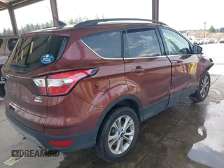 2018 Ford Escape SEL with VIN 1FMCU9HD0JUC36389, listed as a IAAI auction lot 41997627 with 96,739 mi miles. Bid and sale history available at carsss.com. Image 4.