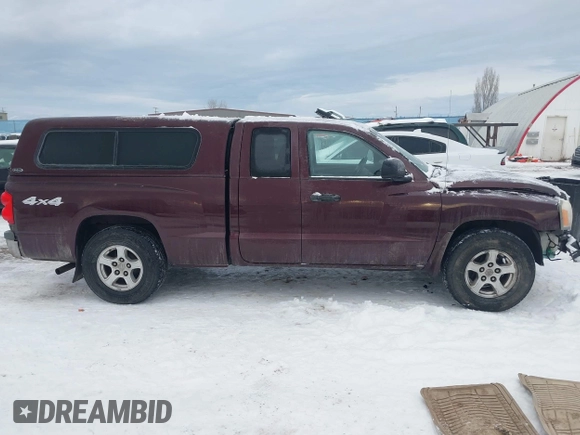 2005 Dodge Dakota SLT with VIN 1D7HW42N65S305733, listed as a IAAI auction lot 41289814 with 149,226 mi miles and . Bid and sale history available at DreamBid. Image 14.