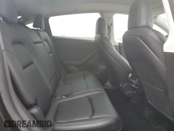2022 Tesla Model Y Long Range with VIN 7SAYGAEE1NF381491, listed as a Copart auction lot 52694185 with 33,412 mi miles and Salvage Title. Bid and sale history available at DreamBid. Image 10.