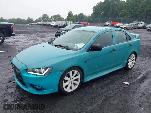 2013 Mitsubishi Lancer GT with VIN JA32U8FW6DU022878, listed as a IAAI auction lot 42449708 with 121,869 mi miles and . Bid and sale history available at DreamBid. Image 17.