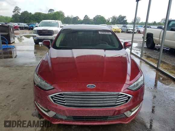 2017 Ford Fusion SE с VIN 3FA6P0HD0HR198416, выставлен на аукционе Copart как лот 57828185 с пробегом 95 955 миль миль и Списание • Salvage title. История ставок и продаж доступна на DreamBid. Изображение 5.