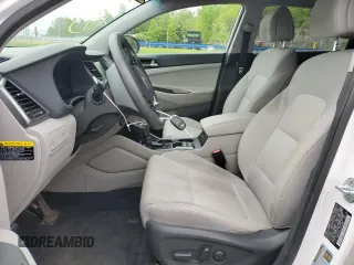 2018 Hyundai Tucson SEL with VIN KM8J3CA41JU713882, listed as a Copart auction lot 56280825 with 140,463 mi miles and Salvage title. Bid and sale history available at DreamBid. Image 7.