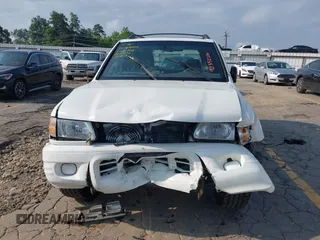 2002 Isuzu Rodeo S with VIN 4S2CK58W524321108, listed as a IAAI auction lot 42352330 with 270,614 mi miles and . Bid and sale history available at DreamBid. Image 6.