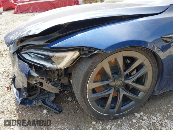 2022 Tesla Model S with VIN 5YJSA1E55NF486443, listed as a IAAI auction lot 42720110 with Not provided miles and . Bid and sale history available at DreamBid. Image 20.