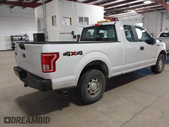2015 Ford F-150 XLT with VIN 1FTEX1EP6FKE21697, listed as a IAAI auction lot 41960136 with 199,653 mi miles. Bid and sale history available at carsss.com. Image 4.