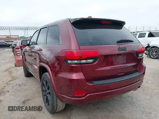 2018 Jeep Grand Cherokee Altitude with VIN 1C4RJEAGXJC281236, listed as a IAAI auction lot 42378899 with 102,276 mi miles and . Bid and sale history available at DreamBid. Image 3.