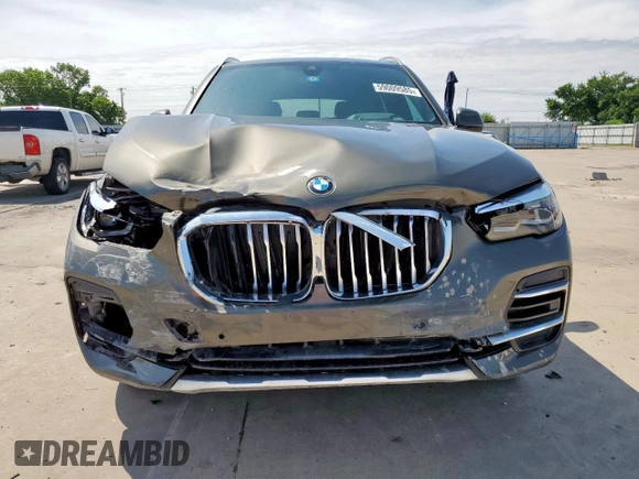 2023 BMW X5 xDrive40i with VIN 5UXCR6C01P9P27041, listed as a Copart auction lot 59009585 with 45,568 mi miles and Salvage title. Bid and sale history available at DreamBid. Image 5.