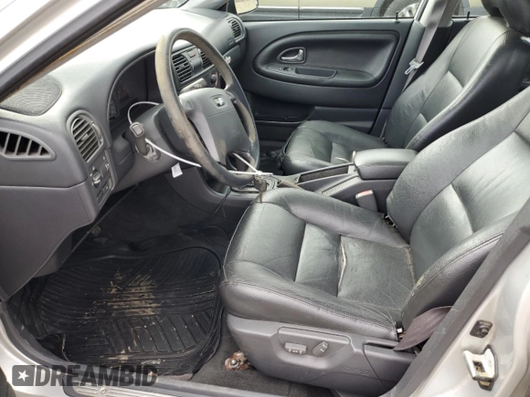 2001 Volvo V40 z VIN YV1VW29581F738166, wystawiony jako Copart lot #86166264 z przebiegiem 83 518 mil mil oraz Tytuł czysty. Historia ofert i sprzedaży dostępna na DreamBid. Obrazek 7.